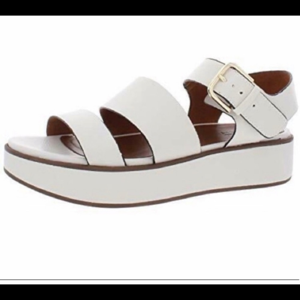 Super trendy. Gently used white platform sandal.